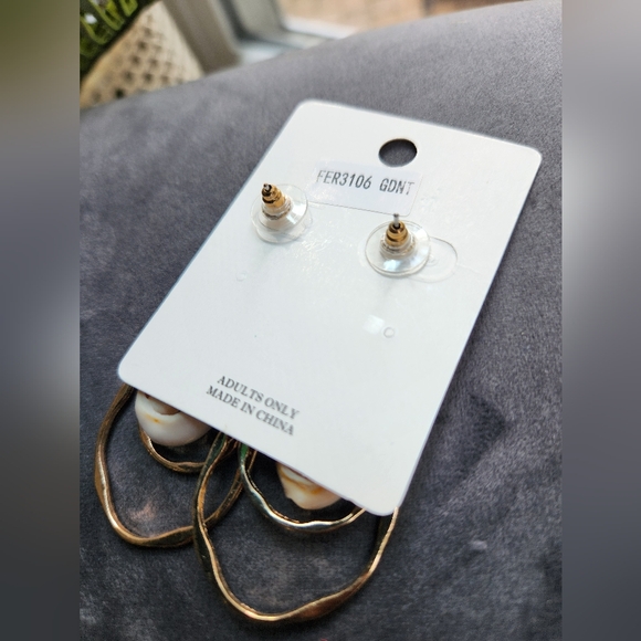 Goldtone Cowrie Shell Pierced Earrings - Picture 2 of 8